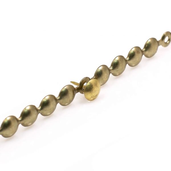 Listwa pinezek ozdonych złotych